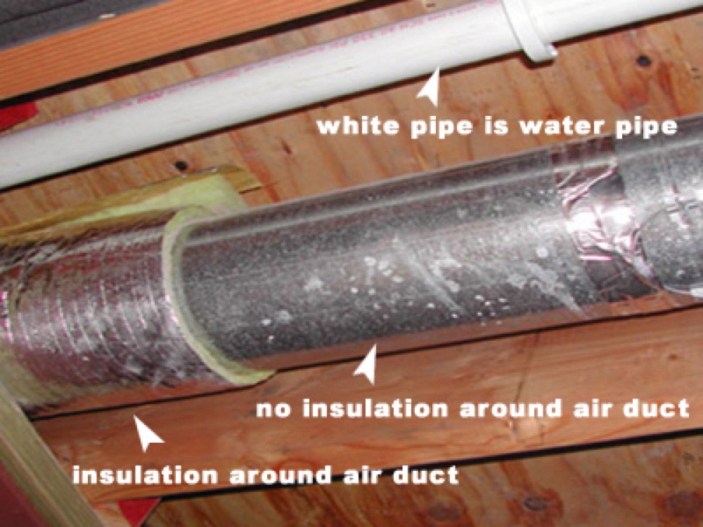 Water droplets condensing on the outside of an uninsulated metal air conditioning duct