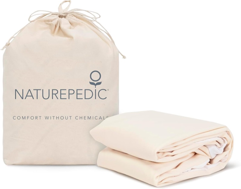 Naturepedic organic waterproof mattress protector folded beside its cotton storage bag